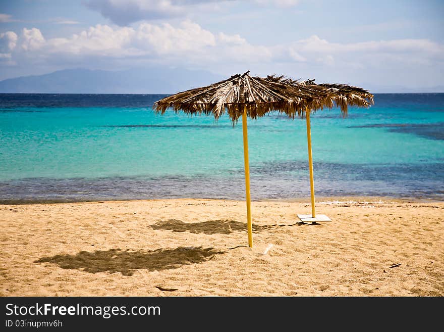 A Mikronow beach named Paradise beach in the day of sunny sky. A Mikronow beach named Paradise beach in the day of sunny sky