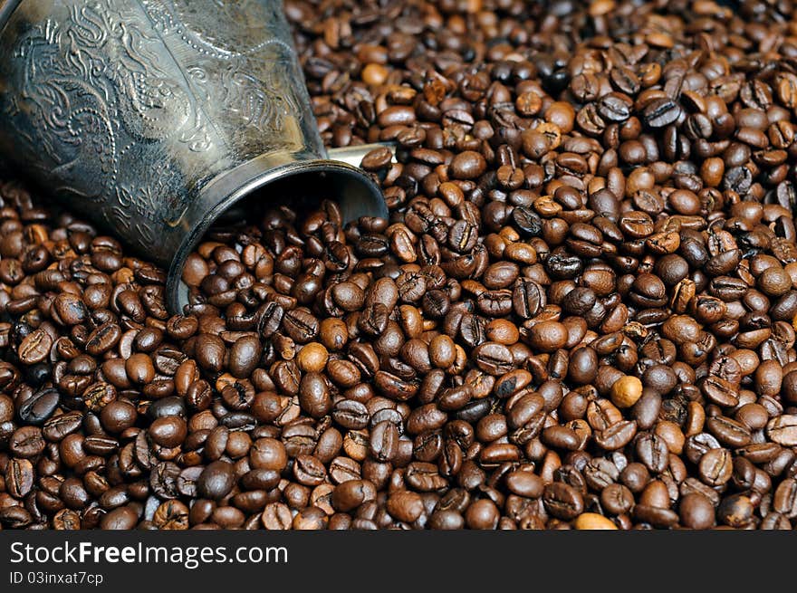 Coffee grains with a mug