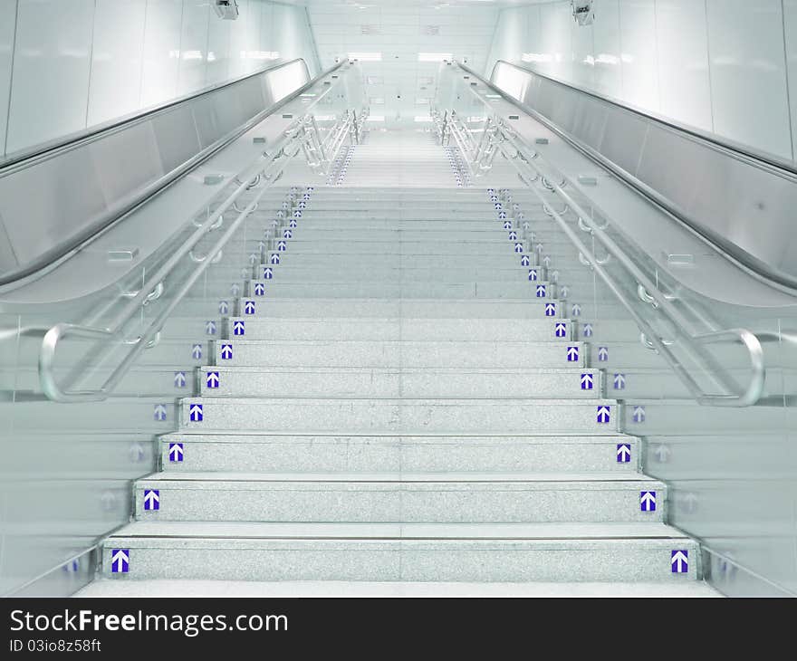 Staircase and escalator in underground passage