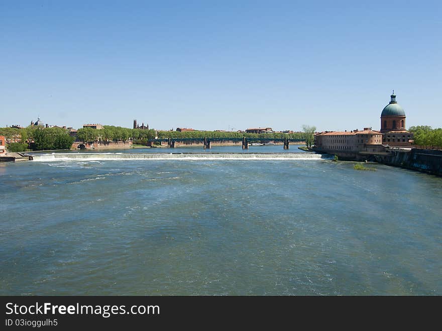 Scenery of Garonne river city Toulouse, France. Toulouse, known as the Ville Rose (Pink City) for its distinctive brick architecture.