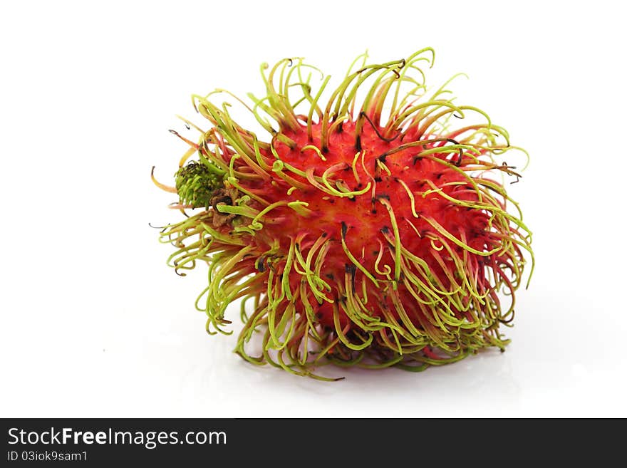 Single Rambutan on white background