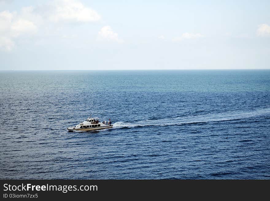 A  speed boat on the sea.