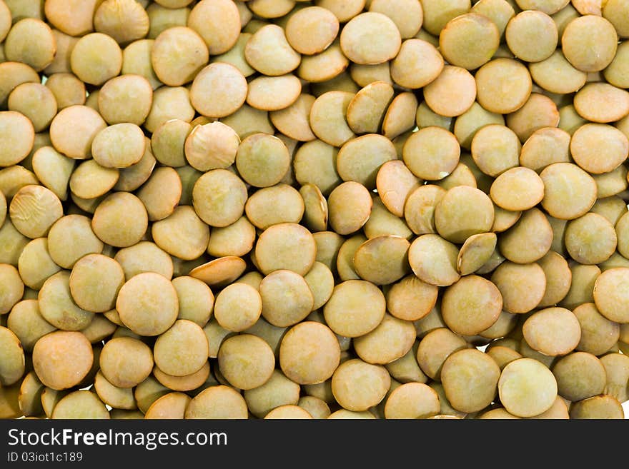 The piled various grains of dry lentil. The piled various grains of dry lentil