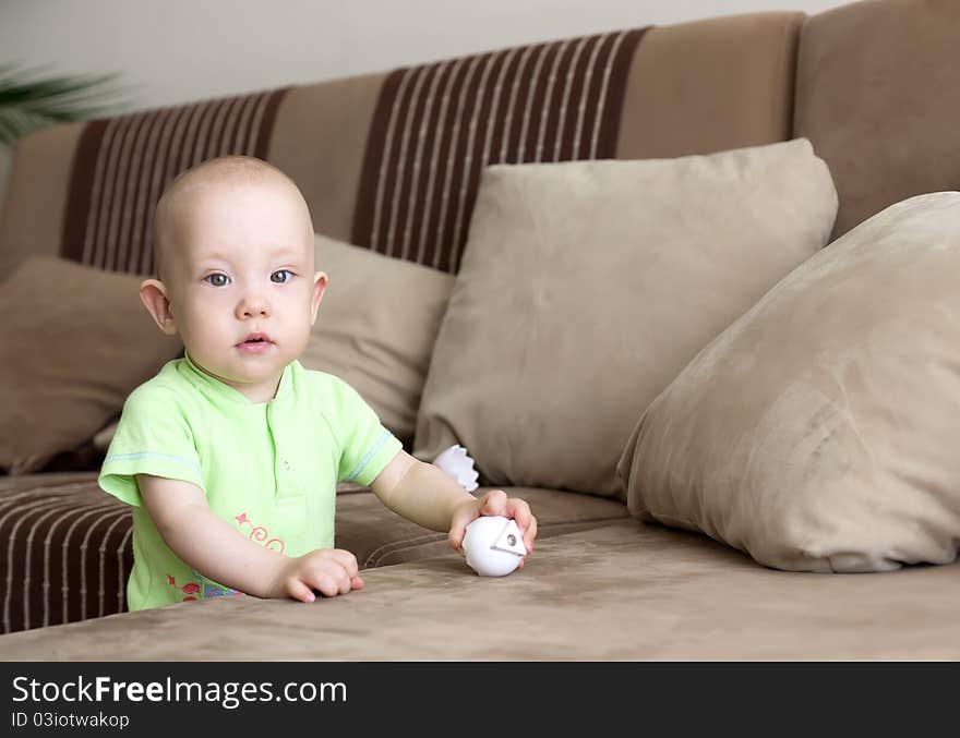 Sweet funny little baby dreamer at home