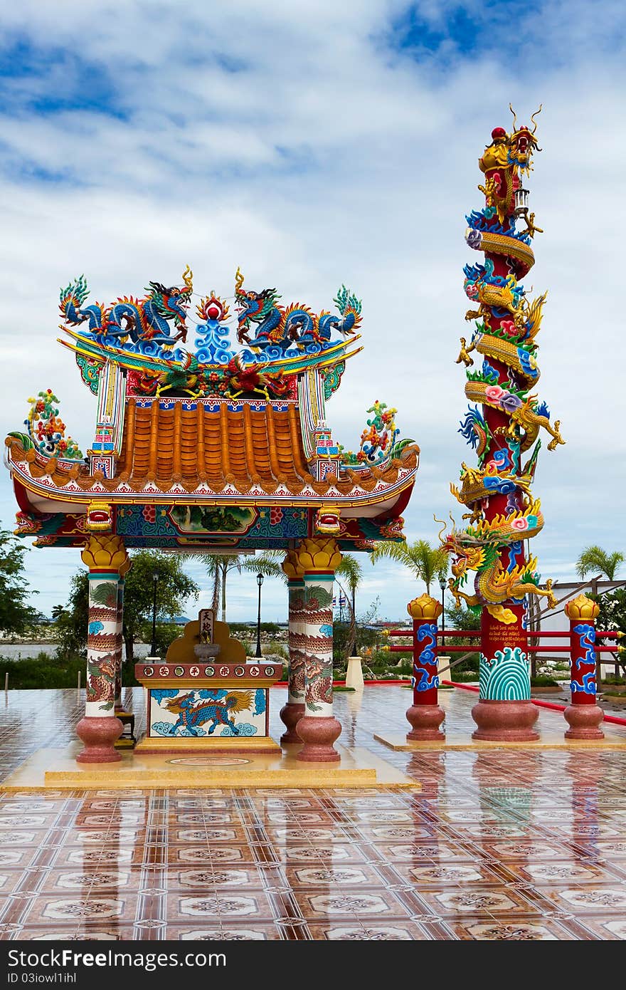 Tower and building are decorated with dragon