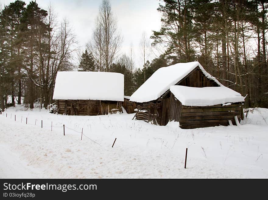 Some wooden structures in village in a winter season