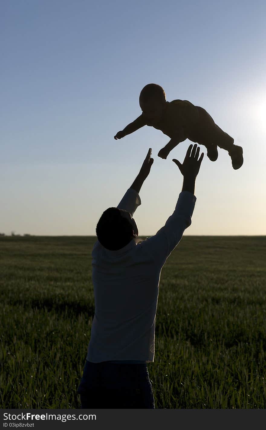 Young man play with son. Young man play with son