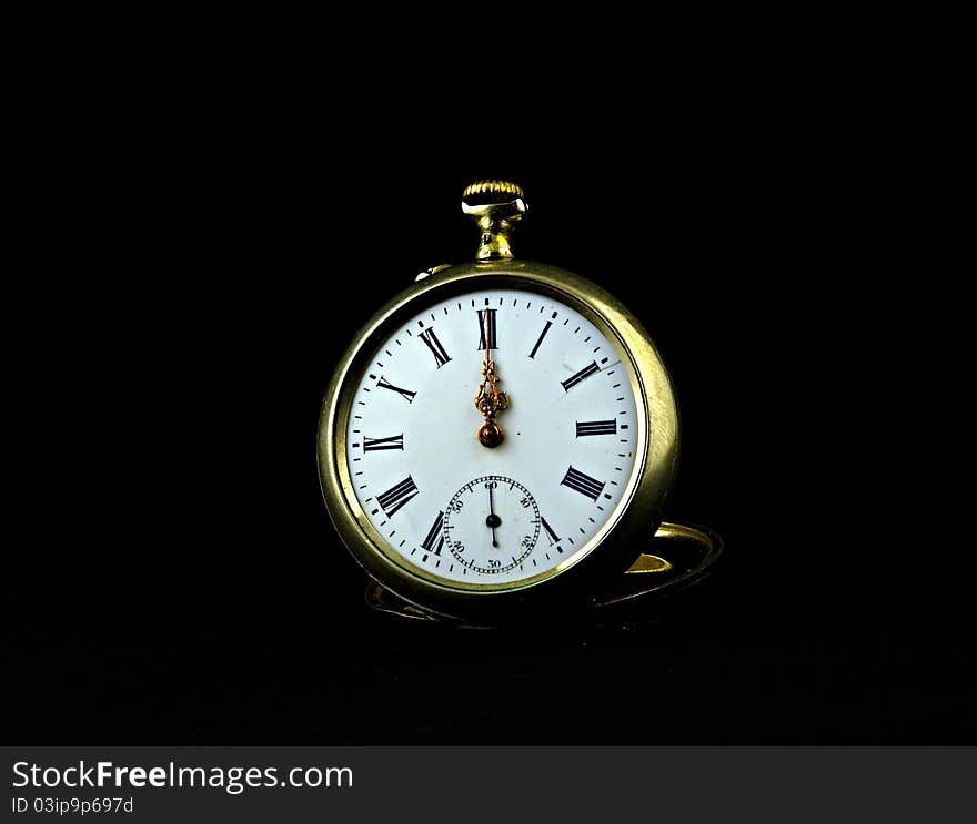 Gold clock on black background. Gold clock on black background