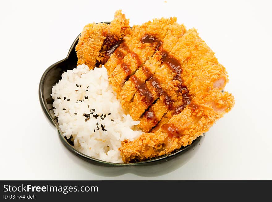 Rice and fried pork cutlet with japanese sweet sauce