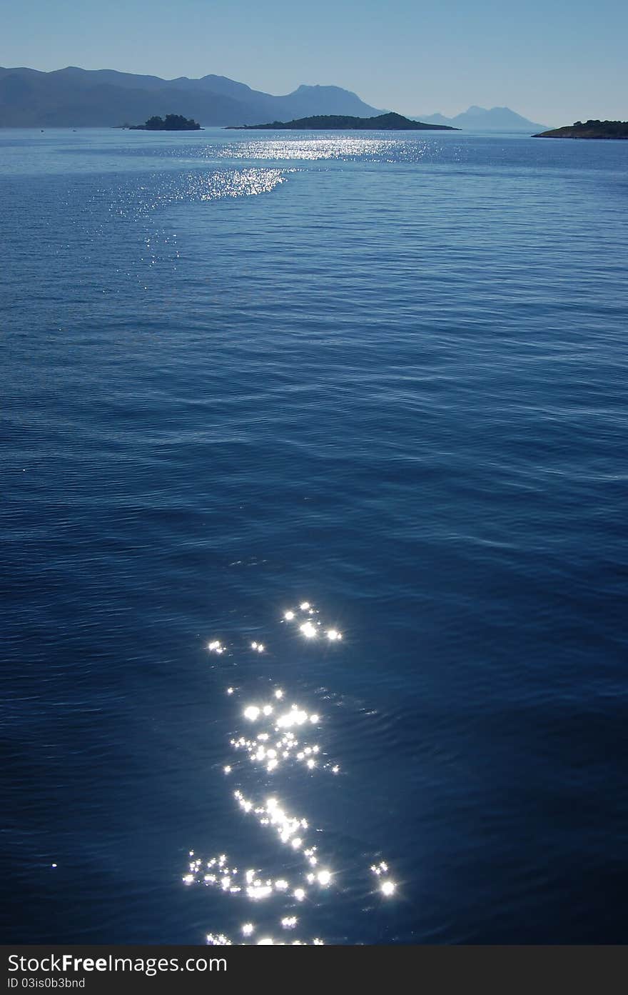 Reflections on the Adriatic Sea showing some of the smaller island of the central Dalmatian archipelago, Croatia. Reflections on the Adriatic Sea showing some of the smaller island of the central Dalmatian archipelago, Croatia