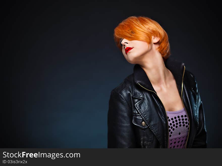 Redhead Woman black leather jacket. Redhead Woman black leather jacket