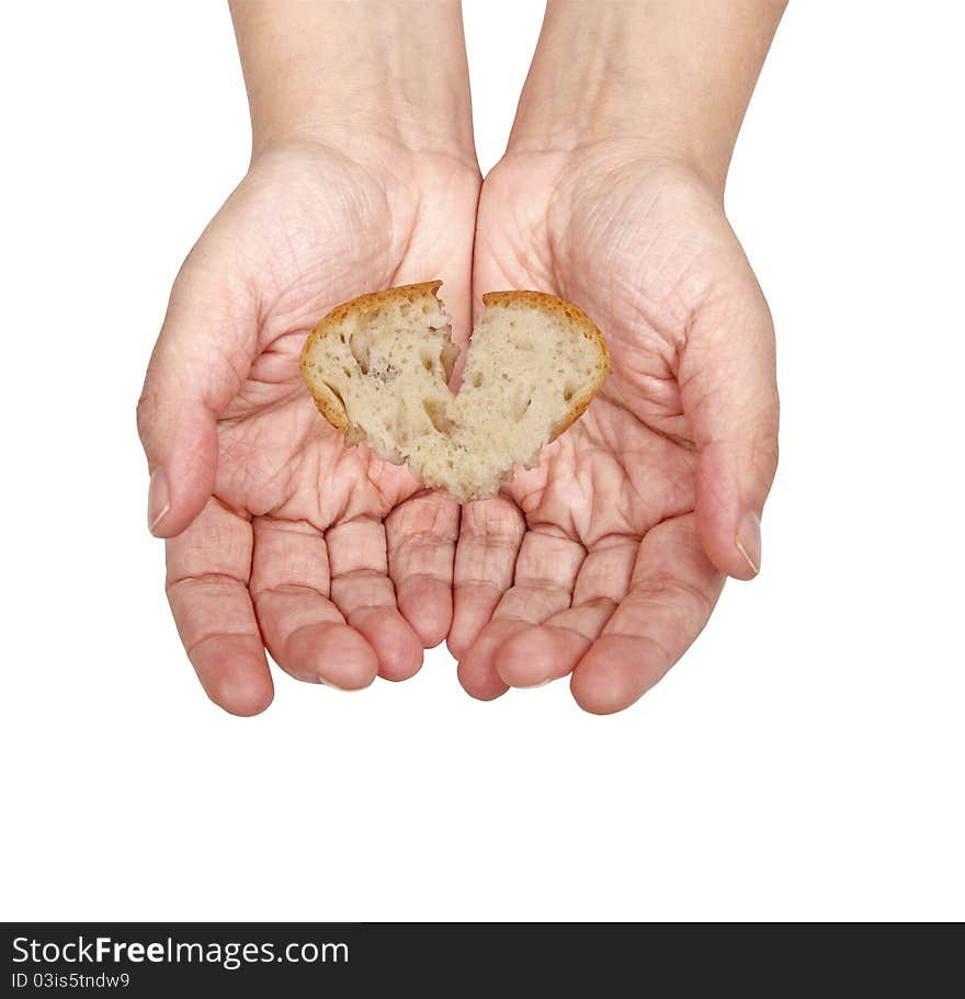 Open beggar hands receiving bread slice, in heart shape