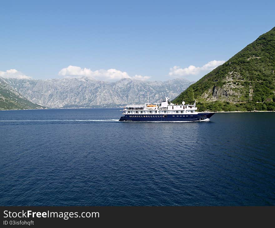 Ship sailing in bay