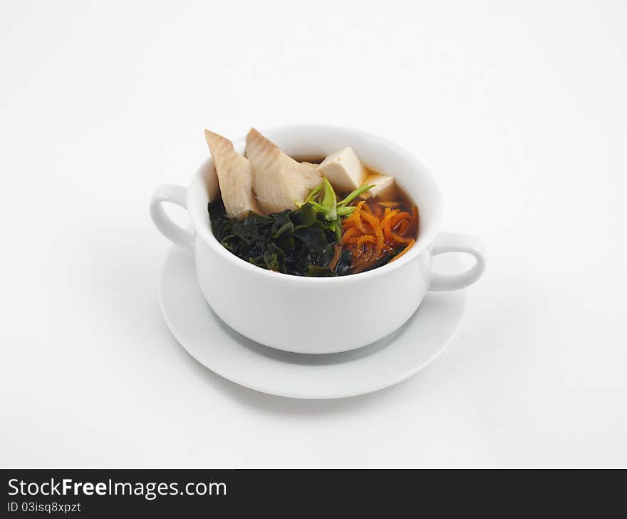 Soup photo in a bowl on a white background. Soup photo in a bowl on a white background