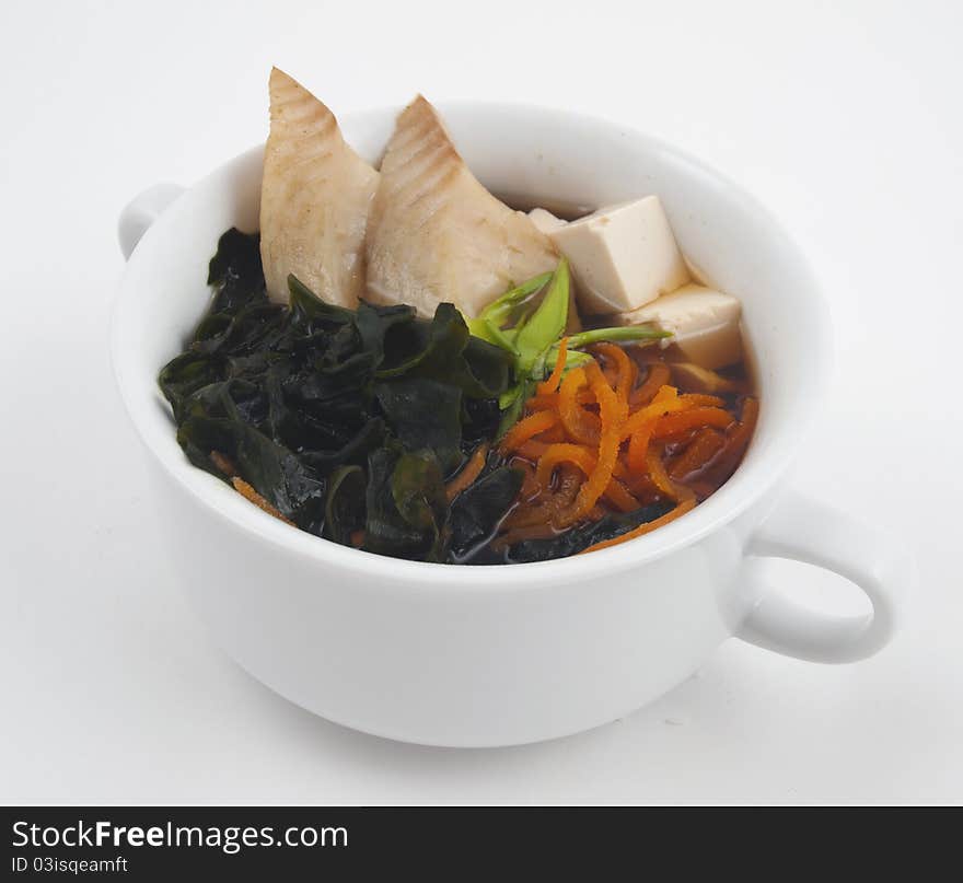 Soup photo in a bowl on a white background. Soup photo in a bowl on a white background