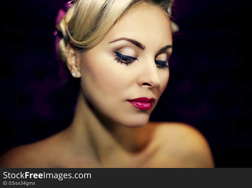 Beautiful female face with fashion make-up