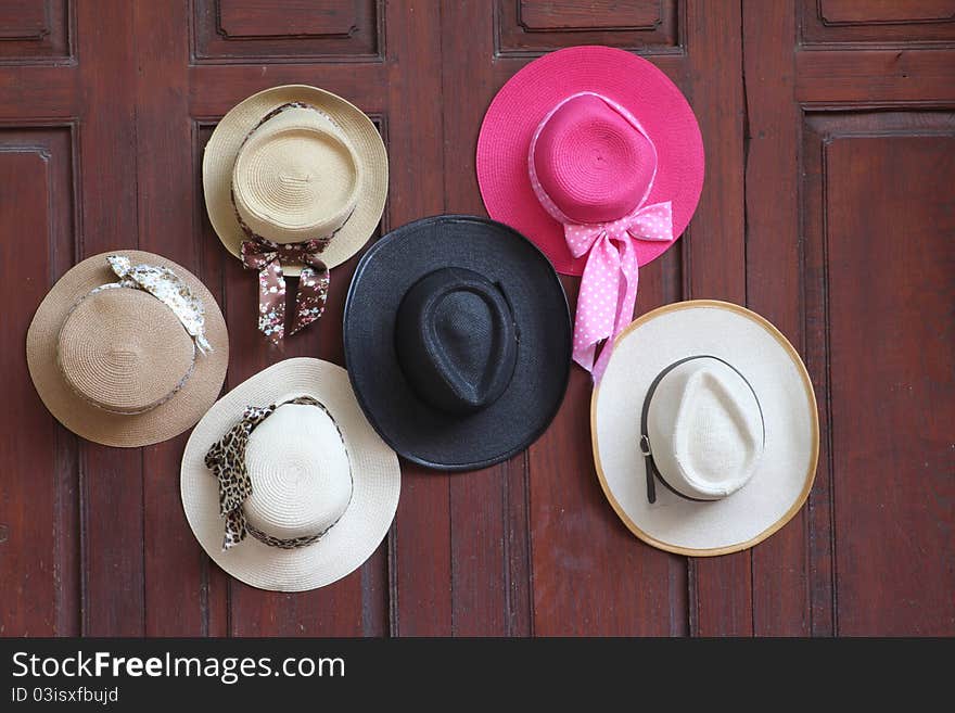 Hats on the wood wall