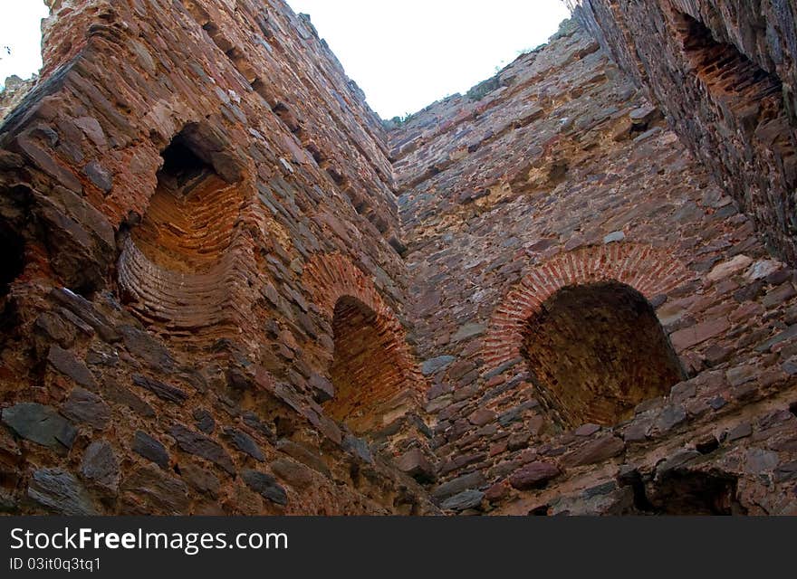 A view to the sky through an old ruins