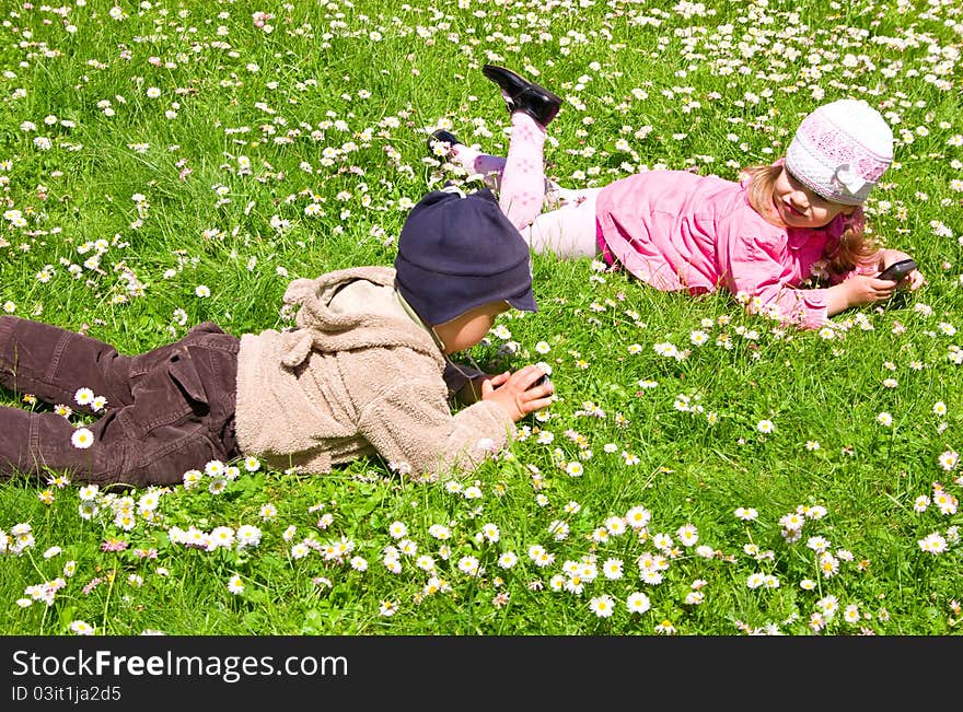 Boy and girl playing in the park