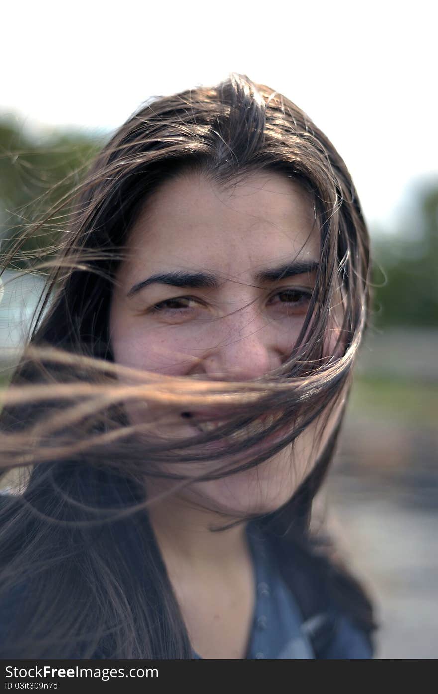 Portrait of a young latin woman outside enjoying the fresh air. Portrait of a young latin woman outside enjoying the fresh air