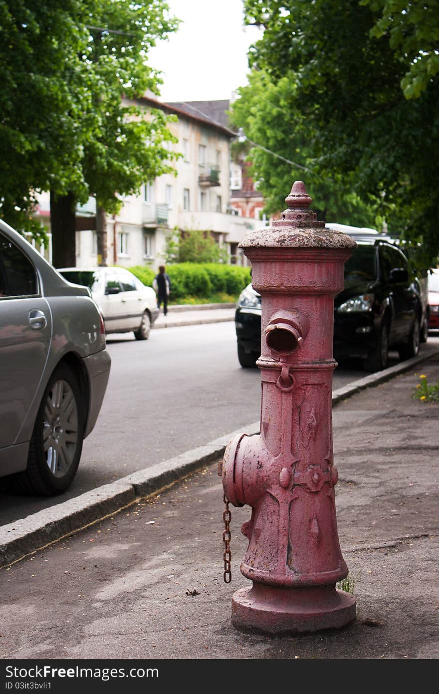 Old abandoned fire hydrant in city street. Old abandoned fire hydrant in city street