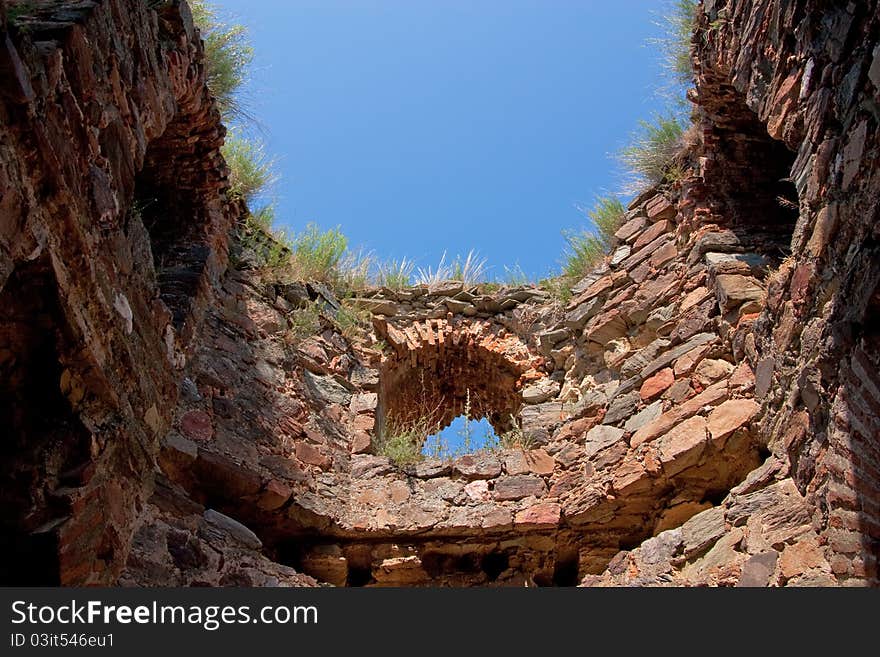 A view to the sky through an old ruins