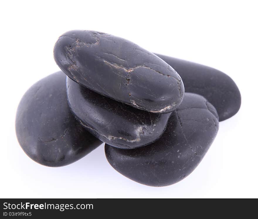 Spa stones on a white background