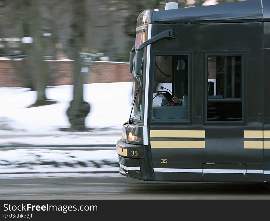 Fast train in Stockholm without the public transport organisation's logo.
Sharp vehicle, blurred background.