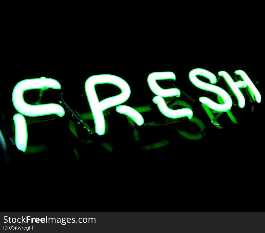 Fresh neon sign on black background