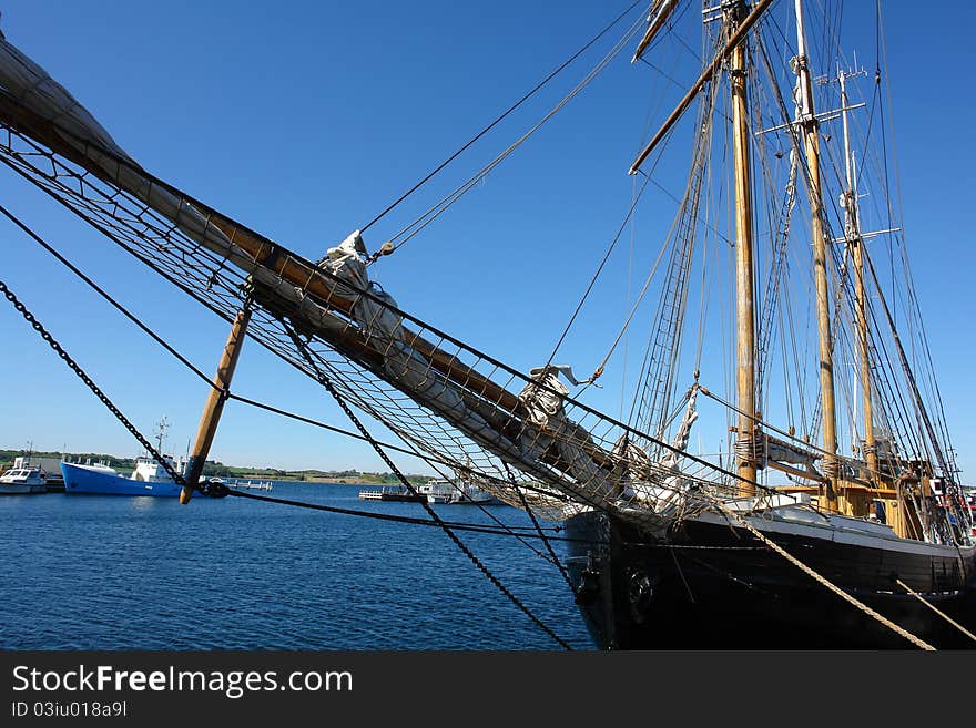 Old beautiful vintage wooden sail boat tall ship marine background. Old beautiful vintage wooden sail boat tall ship marine background