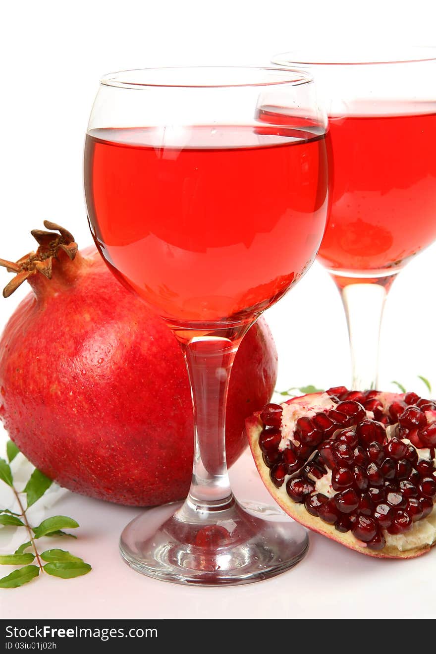 Fresh fruit and juice on a white background