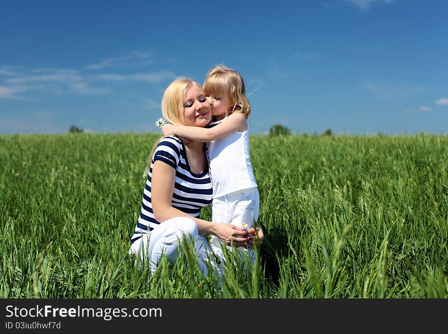 Mother with her daughter outdoors