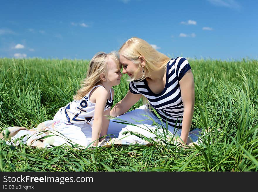 Mother with her daughter outdoors