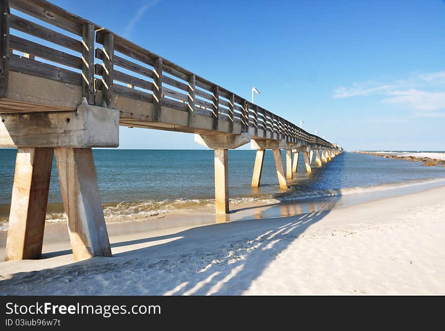 A wooden elevated walkway projected into the sea at Fort Clinch State Park, Florida. A wooden elevated walkway projected into the sea at Fort Clinch State Park, Florida