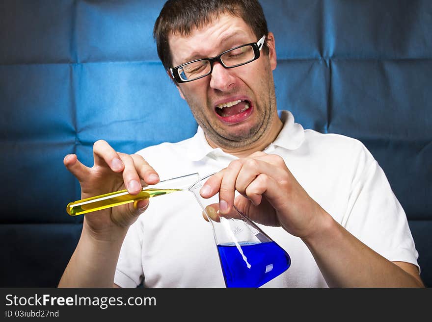 Mad scientist with vials studio shot