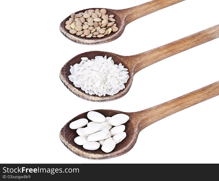 Wood Spoons With Beans, Lentils And Rice Isolated