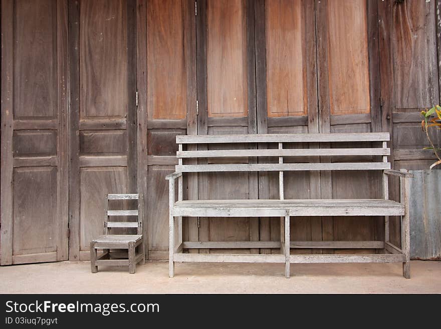 Wood chair at wood wall