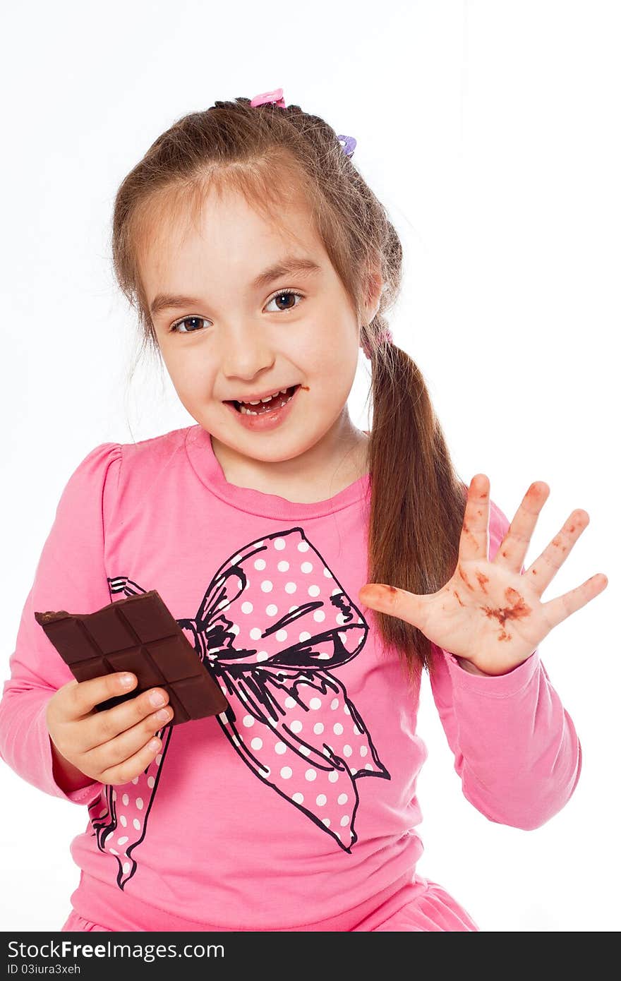 Foto-little girl eating chocolate