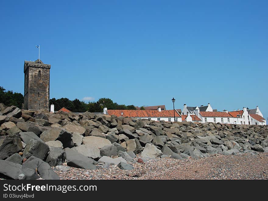 An old ruined tower above the shore line at the Fife coastal village of Dysart. An old ruined tower above the shore line at the Fife coastal village of Dysart