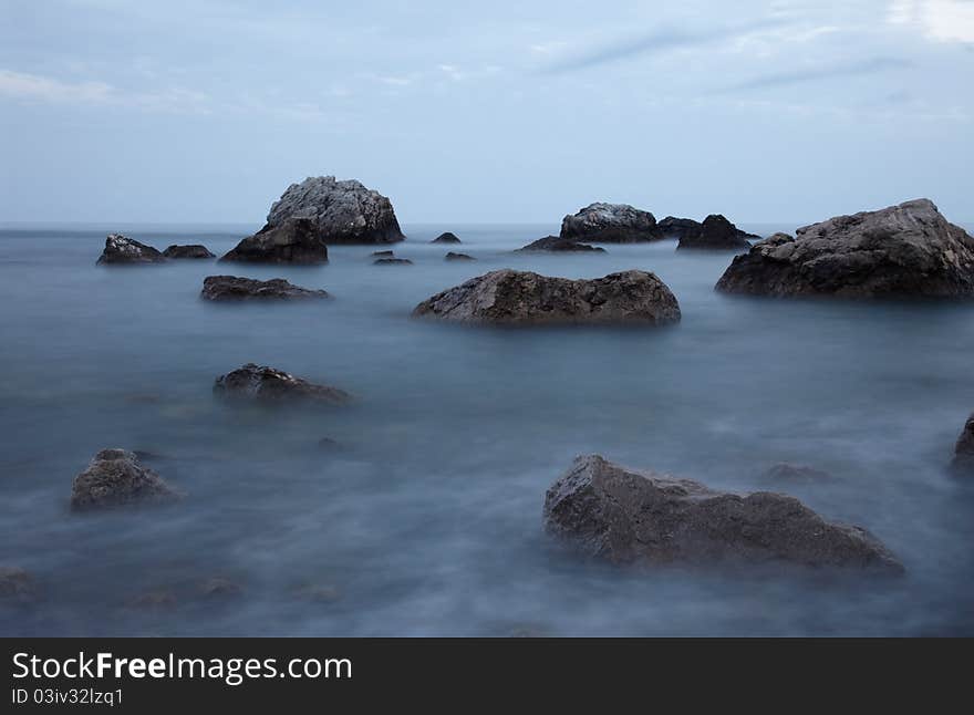 Rocks in th tranquill water. Rocks in th tranquill water