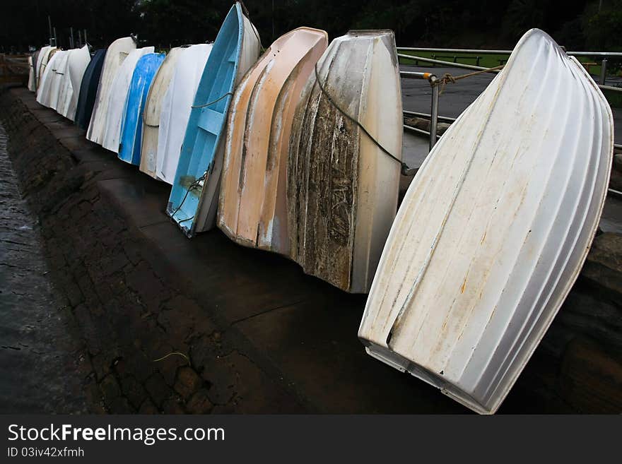 Resting dinghys against a rail