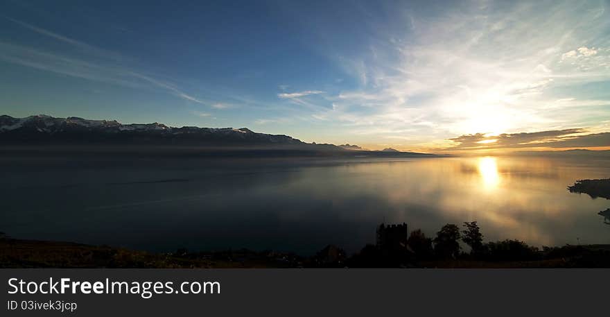 A serene sunset over a lake