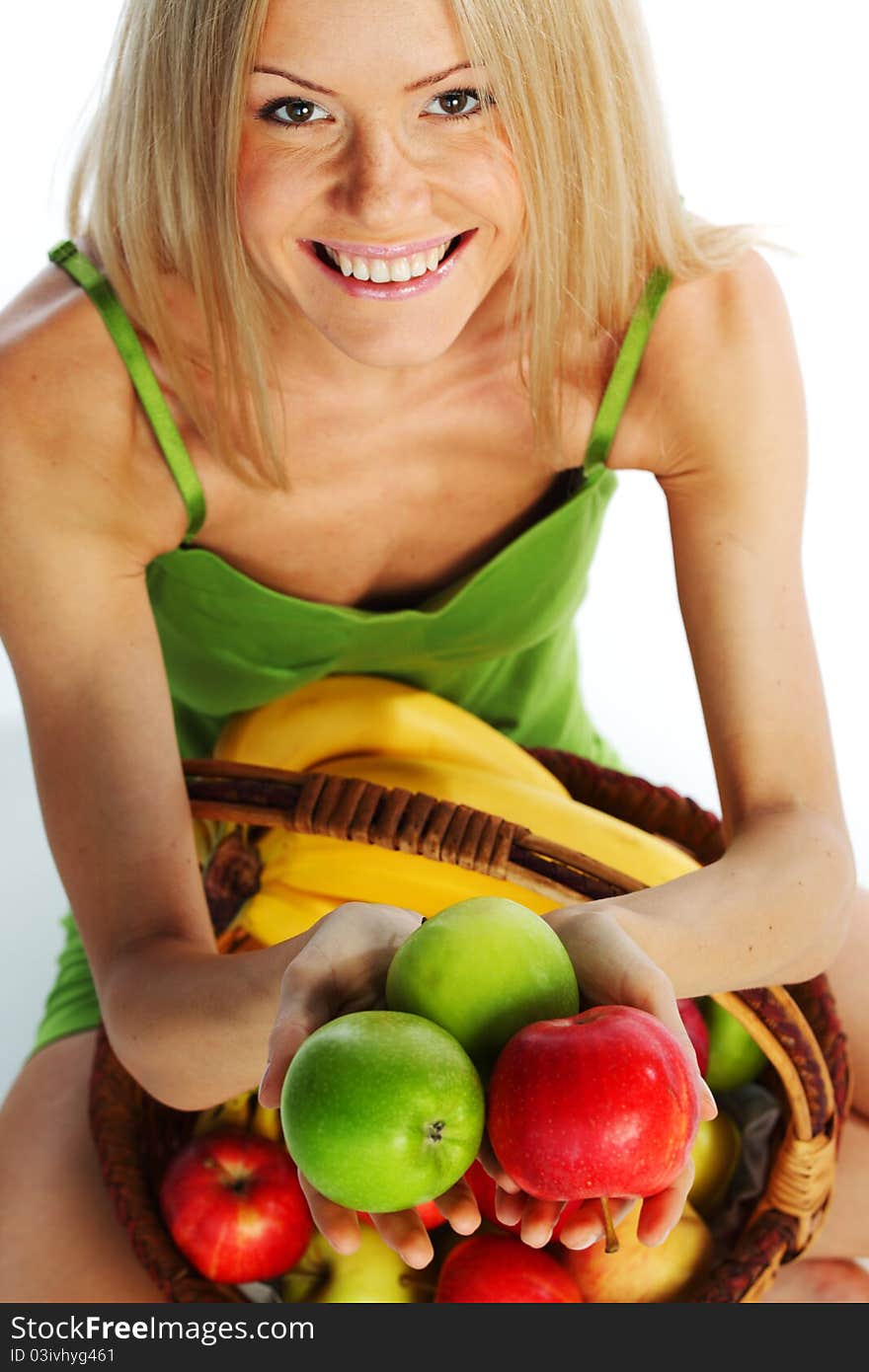 Woman Holds A Basket Of Fruit