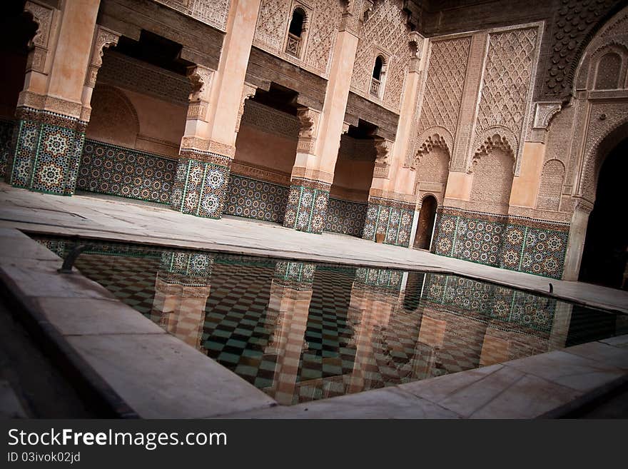 Prime view of the center of the Medersa, with its beautiful pool of undisturbed water. Prime view of the center of the Medersa, with its beautiful pool of undisturbed water