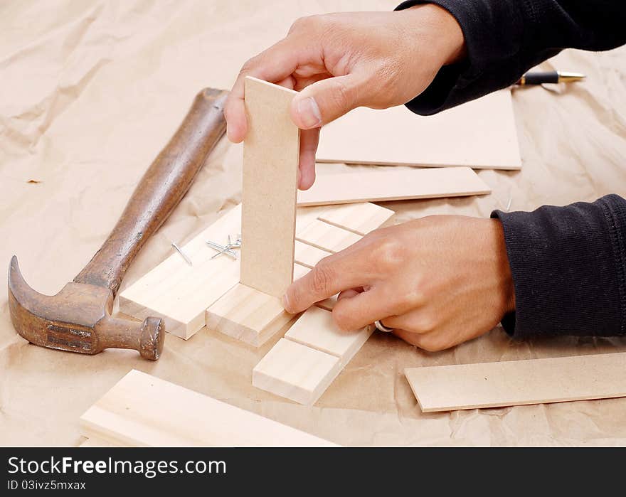 Wood Worker Building A Small Project