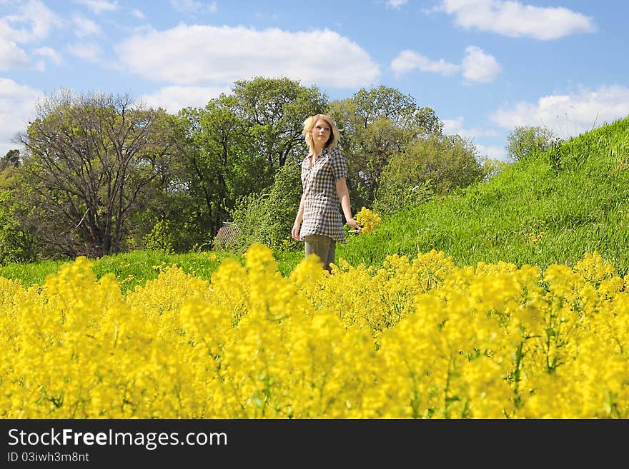 A Girl In The Field Of Flowers