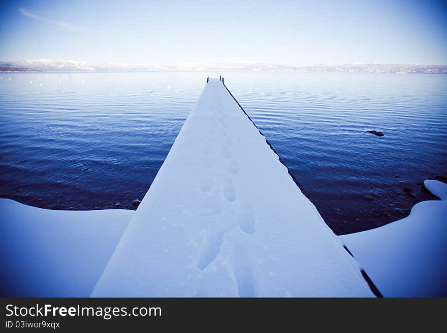 Snow covered pier