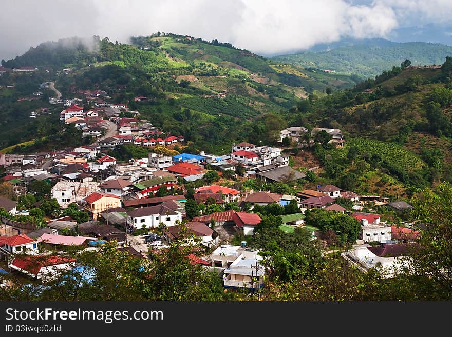 Bird eye view of the city along mountain in Thailand