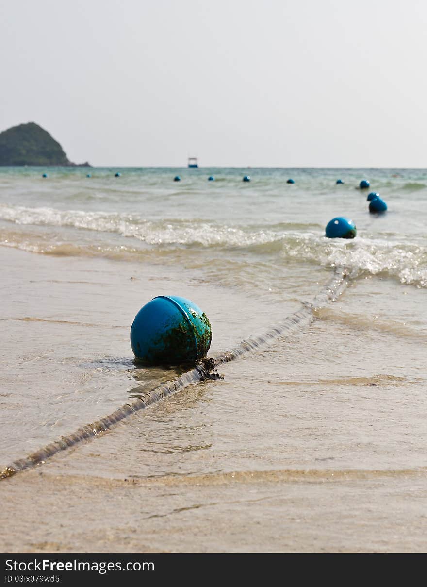 Blue buoy on the beach. Blue buoy on the beach