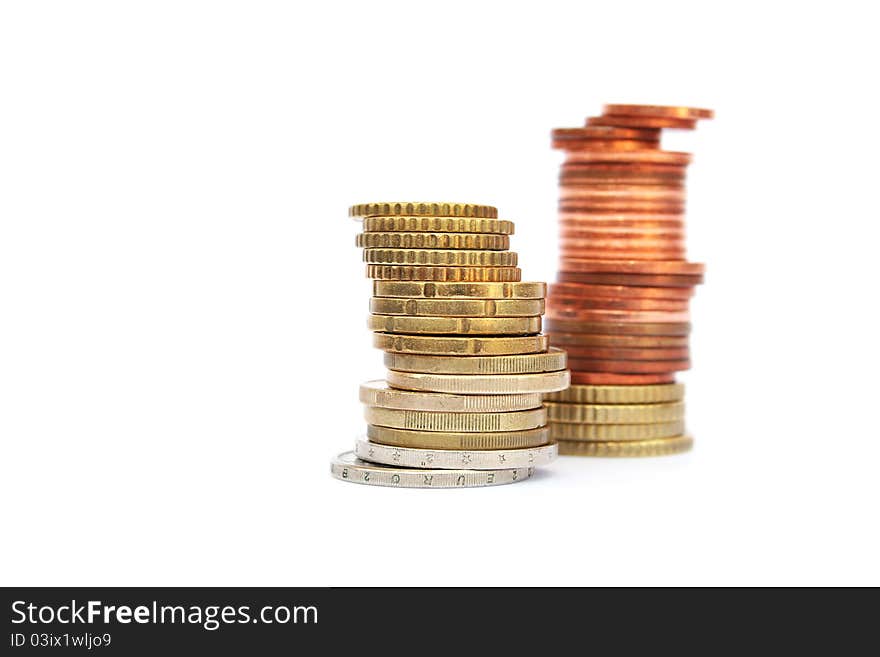 Stack of coins isolated on white background.